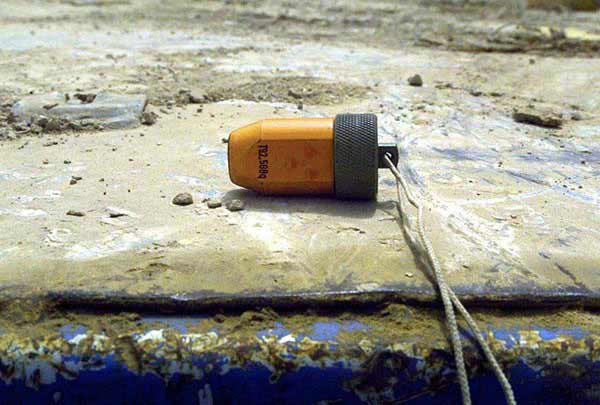 A detonator is used to destroy ammunitions found in a captured Iraqi military truck halted by 3rd the Battalion, 1ST Marine Regiment, Regimental Combat Team 1 (RCT1) in Al Fajr, Iraq, in support of Operation Iraqi Freedom. 30 March, 2003.