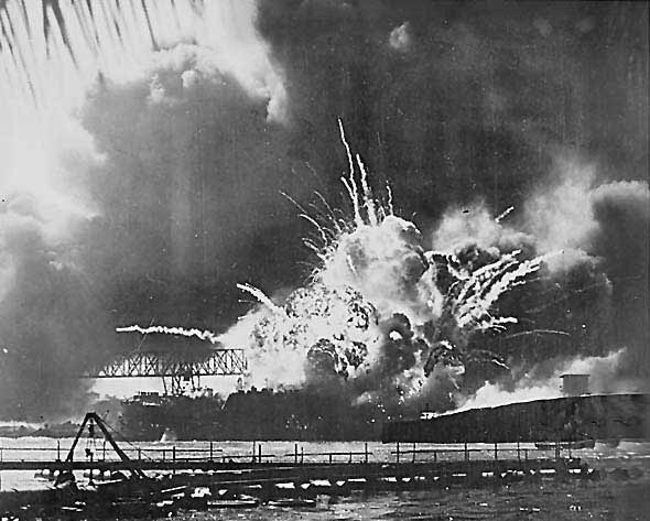 The terrific explosion of the destroyer USS SHAW when her magazine exploded after being bombed by Japanese aircraft in the sneak attack on Pearl Harbor on 07 December 1941.