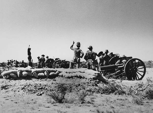 A battery of U.S. Marine artillery firing on the rifle range at Camp Kearney, California, 1933.
