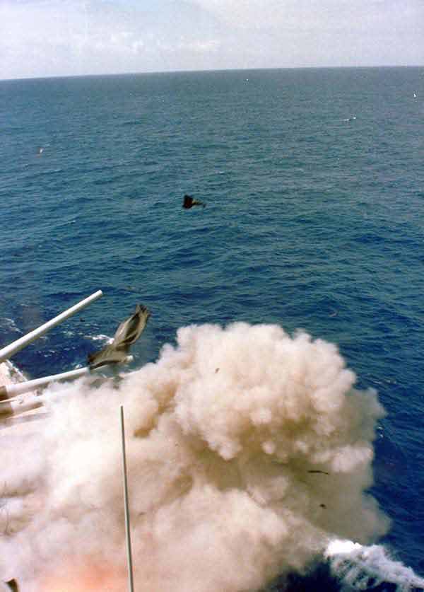A photo taken from the bridge captures the explosion of the No. 2 16-inch gun turret aboard the battleship USS IOWA (BB-61). It was later determined that 47 sailors were killed by the blast, which occurred as the IOWA was conducting routine gunnery exercises 330 miles northeast of Puerto Rico; 4/19/1989.