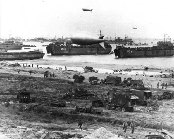 Barrage balloons protect the Normandy Invasion.